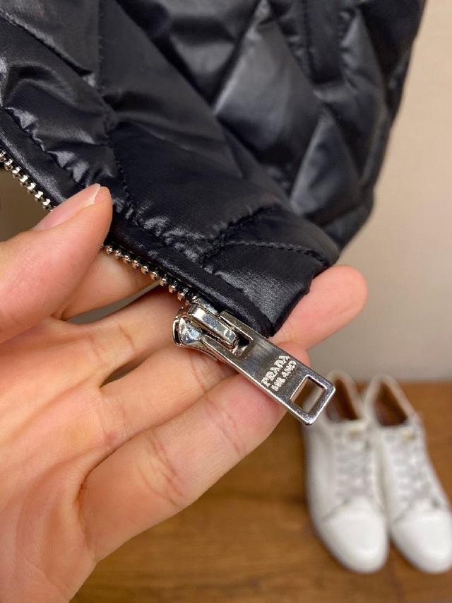 简约又高级	。高品质羽绒填充，保暖力
