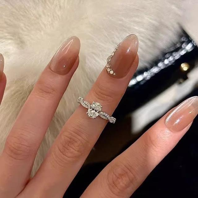 (預購)芭蕾鴿子蛋輕奢鑽石纏繞可調節戒指