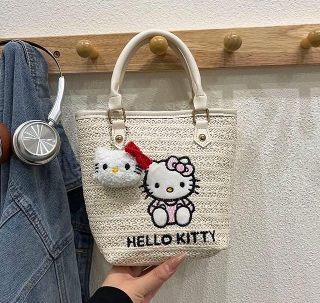 卡通KT刺繡含吊飾皮革手把草編包