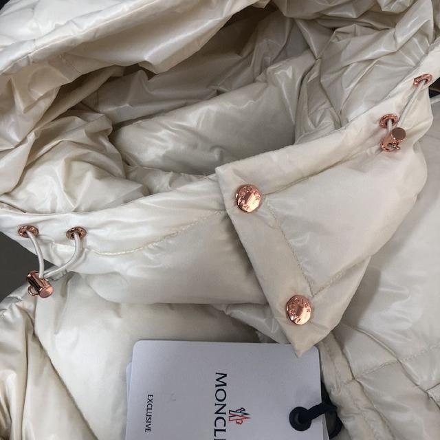 盟可睐 25新款serfanto连帽双排扣男女同款羽绒服