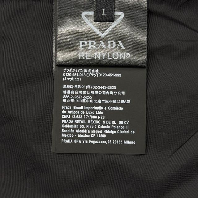 @ Re-Nylon 拉链尖领长袖徽标夹克外套